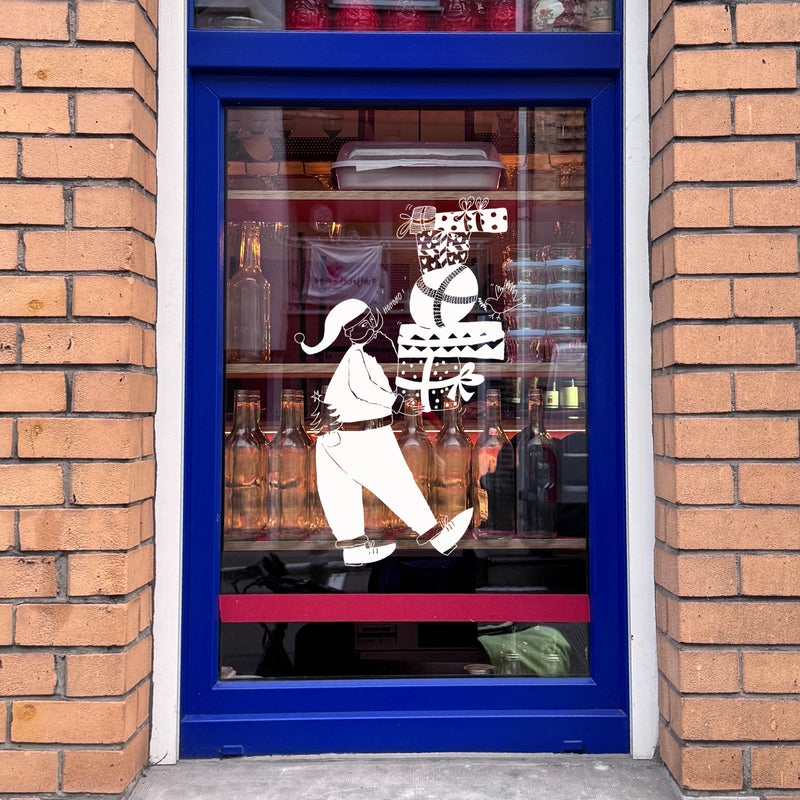 raamsticker santa balancing presents