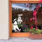 raamsticker santa balancing presents