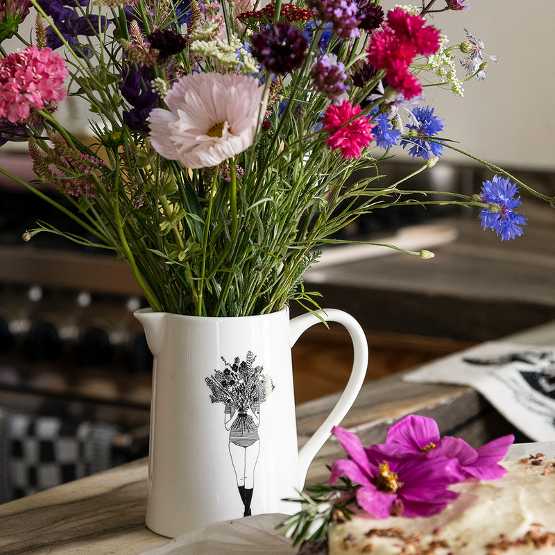 large jug flower girl